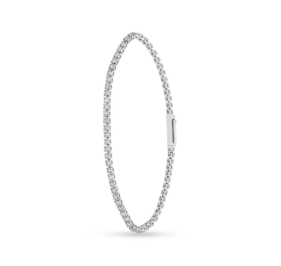 Теннисный браслет из белого золота с круглым бриллиантом натуральной огранки и зубцами в виде коробочки из белого золота