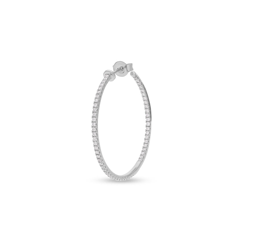 Серьги-кольца из белого золота с бриллиантом круглой огранки и закрепкой зубцов 