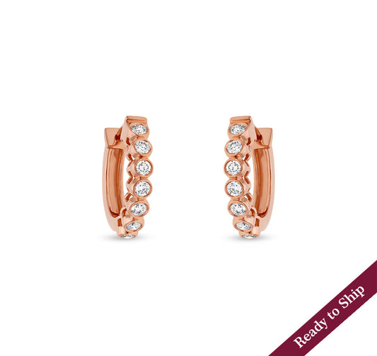 Серьги-кольца из розового золота с натуральными бриллиантами в оправе 