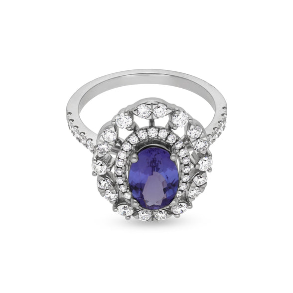 Кольцо Halo из белого золота с синим овальным танзанитом и круглым натуральным бриллиантом 