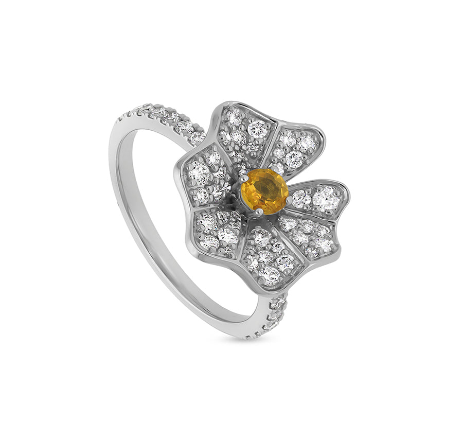 Коктейльное кольцо из белого золота с круглым сапфиром и желтым бриллиантом цветочной формы 