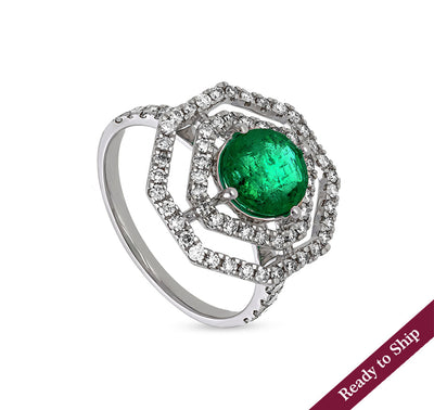 Коктейльное кольцо из белого золота с зеленым камнем восьмиугольной формы и круглым натуральным бриллиантом 