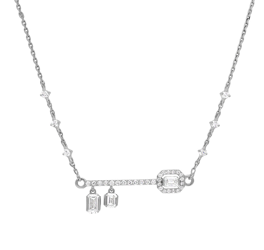 Ожерелье ключевой формы и капли из белого золота с изумрудом и бриллиантами 